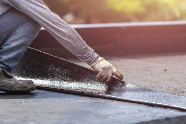 Professional Emergency Waterproofing technician working in Red Hill, PA